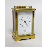 A brass eight day carriage timepiece, retailed by Comitti of London, 12cm high