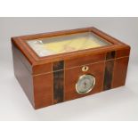 A sealed case of Monte Cristo Habana cigars together with a humidor, the humidor 16cm high x 34.