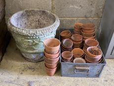 Approximately 45 assorted small terracotta pots and a circular reconstituted stone planter, diameter