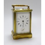 A cased Waterhouse & Sons repeating carriage clock, 27cm high, in travelling case