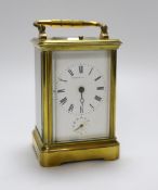 A cased Waterhouse & Sons repeating carriage clock, 27cm high, in travelling case