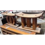 Two African hardwood stools, width 25cm, height 37cm