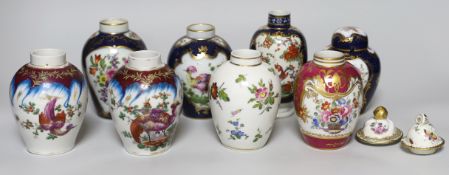 A group of Paris porcelain tea canisters in imitation of Worcester and Sevres, tallest 13.5cm,