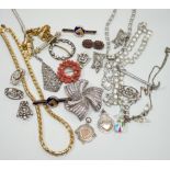 A small collection of assorted costume jewellery including a marcasite set pendant necklace.
