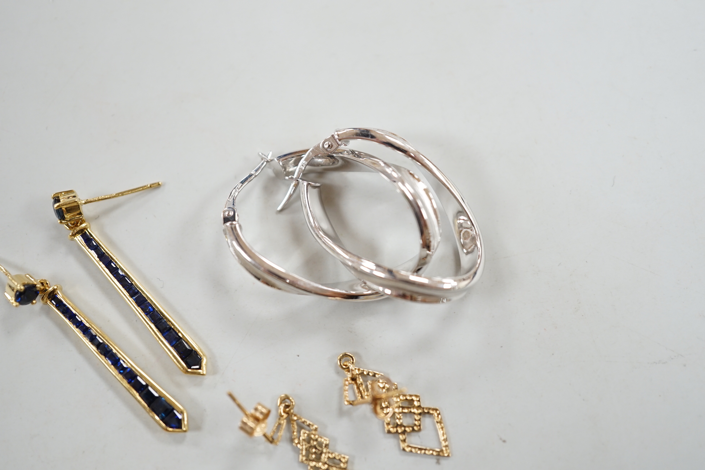 A modern pair of 18ct gold and graduated sapphire set line drop earrings, 35mm, gross weight 3.6 - Image 2 of 5