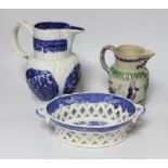 A late 18th century blue and white pearlware jug, a chestnut basket and a Pratt type jug (3), 21.5cm