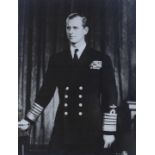 A signed black and white portrait photograph, Prince Philip, by Baron, dated 1955, 43cm wide x