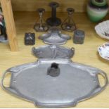 Art Nouveau pewter consisting:- an Orivit two handled tray, pattern 2967, a pair of candlesticks,
