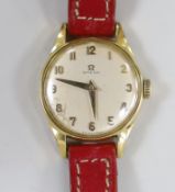 A lady's 18k Omega manual wind wrist watch, on a leather strap with 9ct gold buckle with Omega