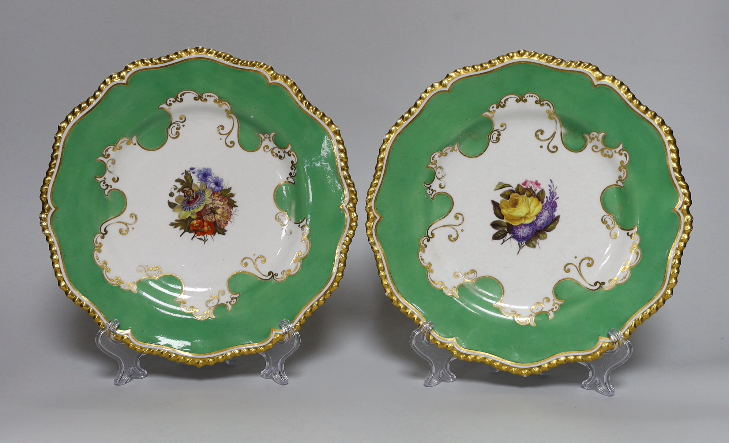 A pair of Flight, Barr and Barr Worcester plates, painted with central bouquets, c.1820, printed