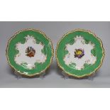 A pair of Flight, Barr and Barr Worcester plates, painted with central bouquets, c.1820, printed