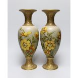 A pair of Royal Doulton earthenware vases, each stamped to the base, 31cm high