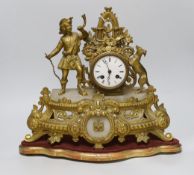 A French gilt-metal and onyx mantel clock, on shaped base, a.f., 52cm high