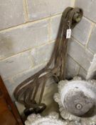 Three wrought iron bench ends / supports, height 100cm