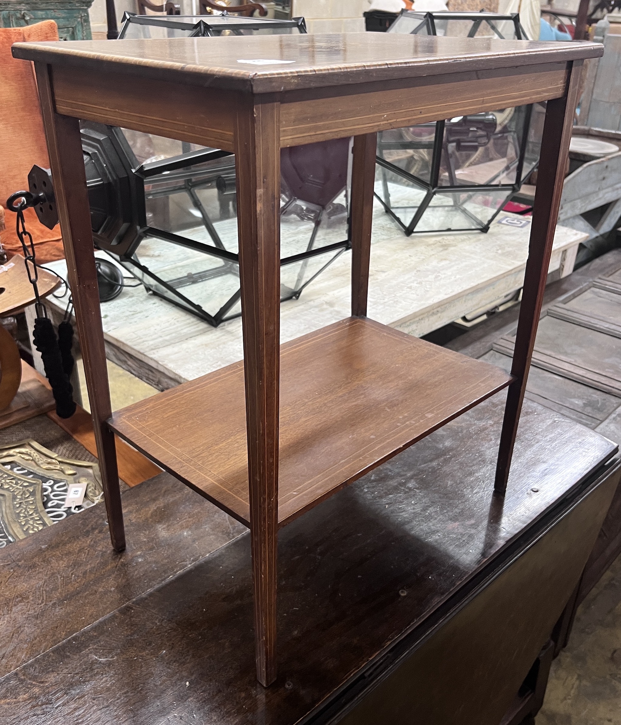 An Edwardian rectangular marquetry inlaid mahogany two tier occasional table, width 80cm, depth