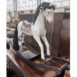 A Victorian style painted hardwood rocking horse, height 80cm