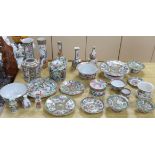 A quantity of 19th century Chinese famille rose dishes, plates, teapots and vases, tallest 21.5cm