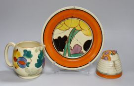 An early Clarice Cliff Fantasque plate, a Clarice Cliff honey pot and a Gray's jug, a.f.
