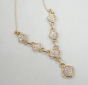 A modern 9k and six pave set diamond panel drop necklace, with rope twist borders, 52cm, gross