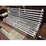 A vintage painted wrought iron slatted wood garden bench, length 198cm, depth 57cm, height 90cm