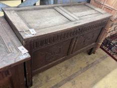 An 18th century carved oak coffer, length 114cm, depth 48cm, height 69cm