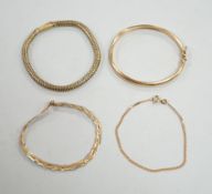 A modern 9ct gold hinged bangle, two modern 9ct gold bracelets including three colour, 14.4 grams