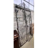 A pair of vintage French wrought iron gates, width 110cm, height 250cm