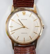A gentleman's 1960's 9ct gold Rolex Precision manual wind wrist watch, on associated leather
