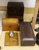 A 19th century mahogany brass bound stationary box, a domed tea caddy, an oak candle box and terrier