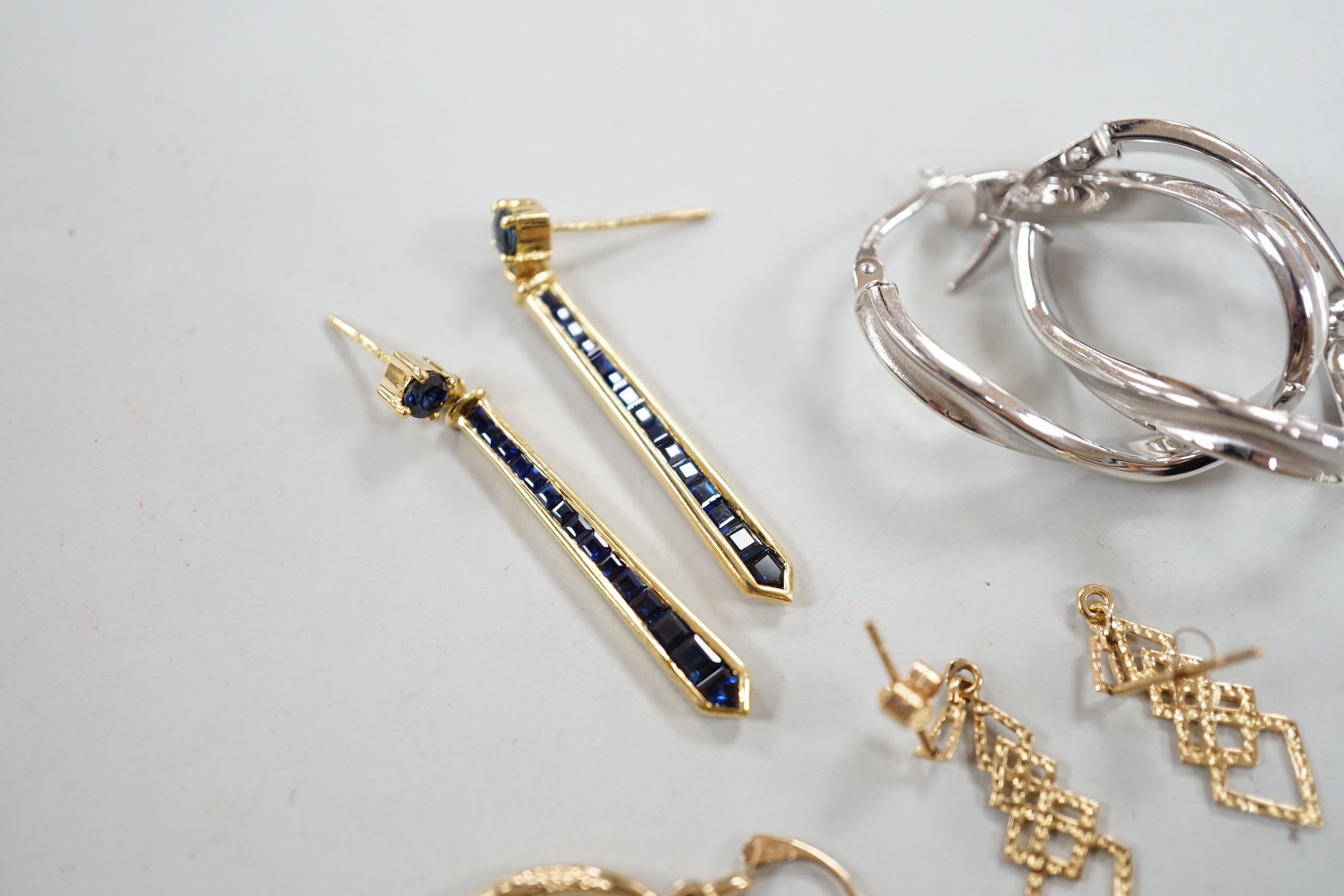 A modern pair of 18ct gold and graduated sapphire set line drop earrings, 35mm, gross weight 3.6 - Image 5 of 5