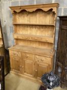 A Victorian style pine dresser, length 122cm, depth 44cm, height 188cm