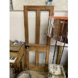 A late 19th / early 20th century pine door, later glazed, height 190cm