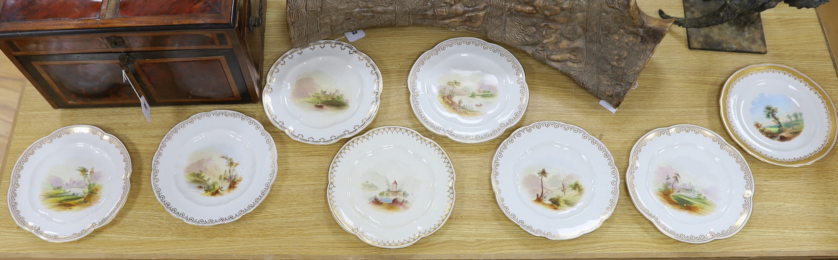 Eight mid-19th century decorative plates, painted with landscapes, probably Coalport, the largest