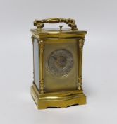 An early 20th century brass repeating carriage clock with silvered dial, 16cm high