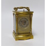 An early 20th century brass repeating carriage clock with silvered dial, 16cm high