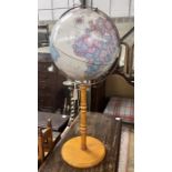 A Replogle 16in. World Classic Series globe on stand, height 95cm