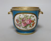 A Minton cache pot in Sevres style, painted with flowers on a turquoise ground, 11cm high