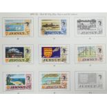 Two New Age stamp albums with QEII stamps and a Channel Islands album