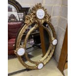 A Victorian style gilt composition and faux marble wall mirror, width 100cm, height 144cm