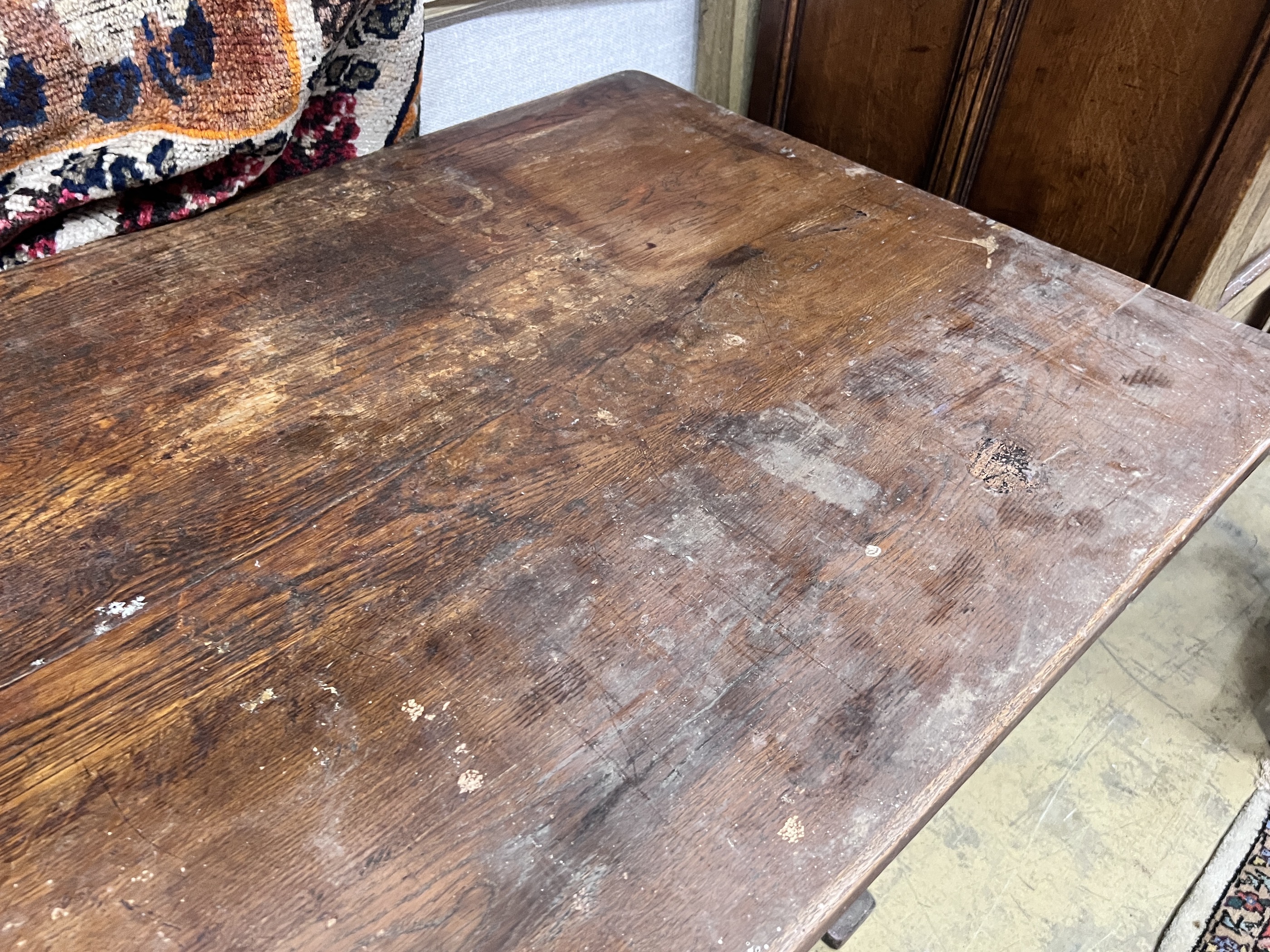 A 1920's rectangular oak dining table, length 145cm, depth 74cm, height 76cm - Image 2 of 5