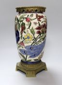 A Zsolnay Pecs brass mounted vase decorated with a peacock amongst flowers, 30cm high