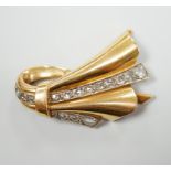 A 1940's/1950's French? yellow metal and graduated rose cut diamond set stylised fan clip brooch,