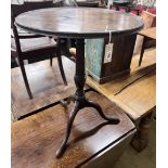 A George III circular mahogany tilt top wine table, diameter 59cm, height 76cm