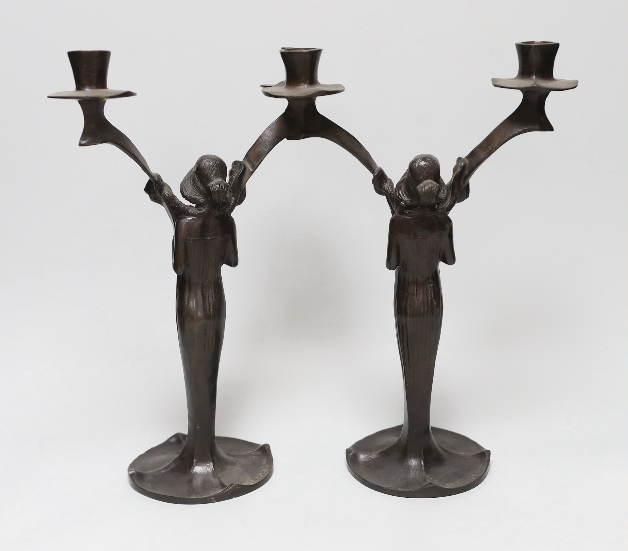 After Jules Moigniez (1835-1984) - a pair of bronze two branch candelabra, signed, dated 1902, - Image 2 of 3