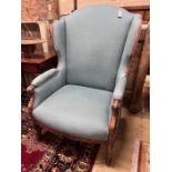 A large Louis XVI style upholstered wing armchair, width 80cm, depth 82cm, height 116cm