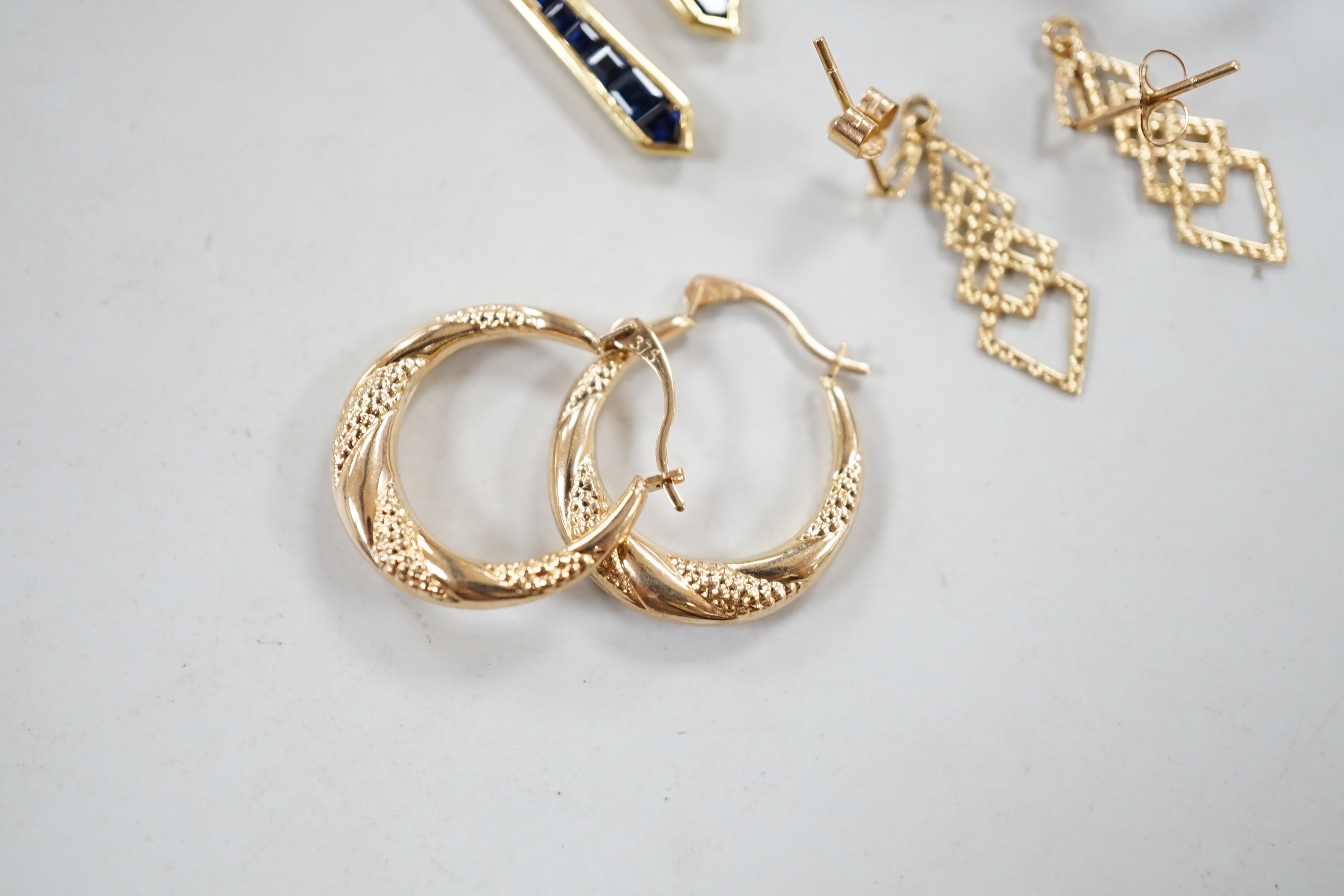 A modern pair of 18ct gold and graduated sapphire set line drop earrings, 35mm, gross weight 3.6 - Image 4 of 5