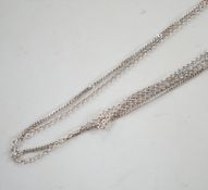 Three assorted modern 18ct white gold fine link chains, longest 42cm, 5.9 grams.