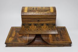 A 19th century Tunbridge ware rosewood tea caddy depicting Bayham Abbey ruins, and a bookslide