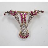 An early 20th century yellow metal, ruby and diamond cluster set brooch (stone missing), width 41mm,