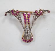 An early 20th century yellow metal, ruby and diamond cluster set brooch (stone missing), width 41mm,